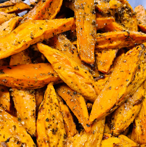 Ottolenghi's puntpaprika met zoete aardappel wedges (V)